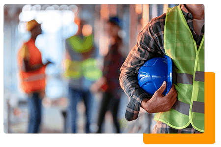 Construction worker holding blue hard hat - net2phone Canada - Business VoIP Phone System