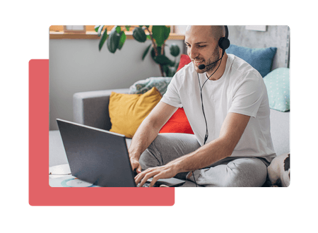Man on headset and laptop