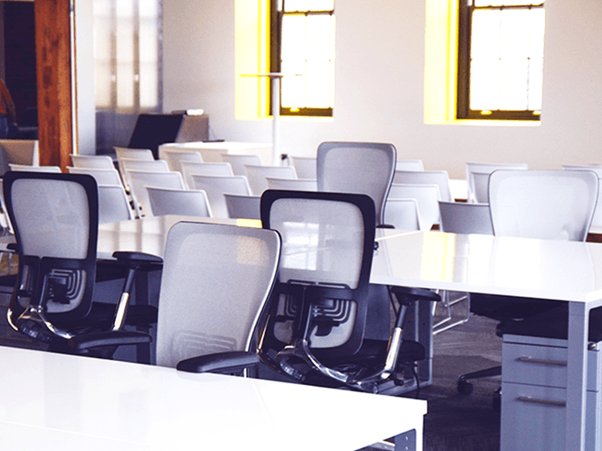 office moving photo of empty desks