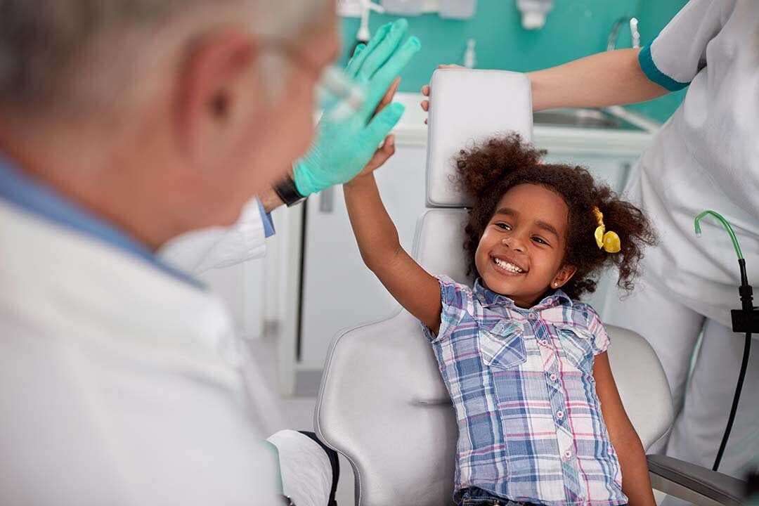 When and how often should kids go to the dentist