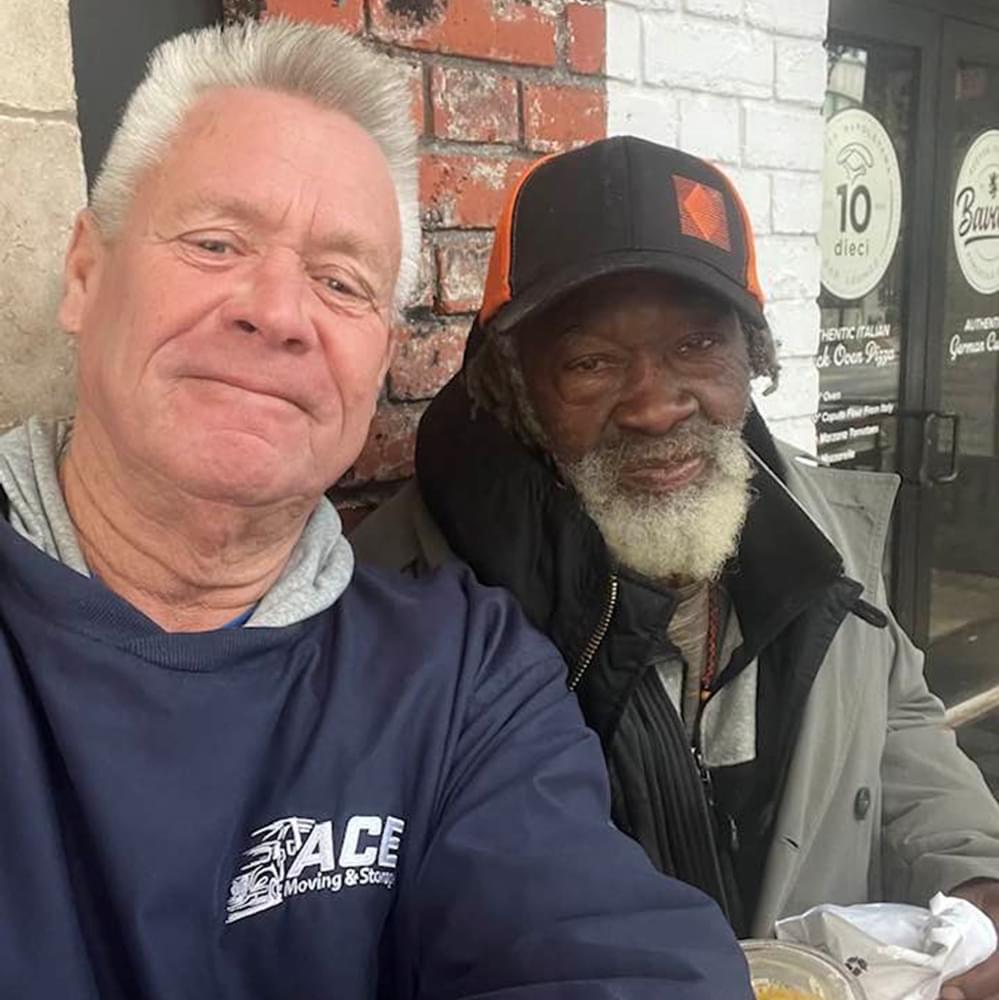 Stephen Nodine, left, with homeless man, “Robert”.  Photo: Nodine Facebook Alabama News