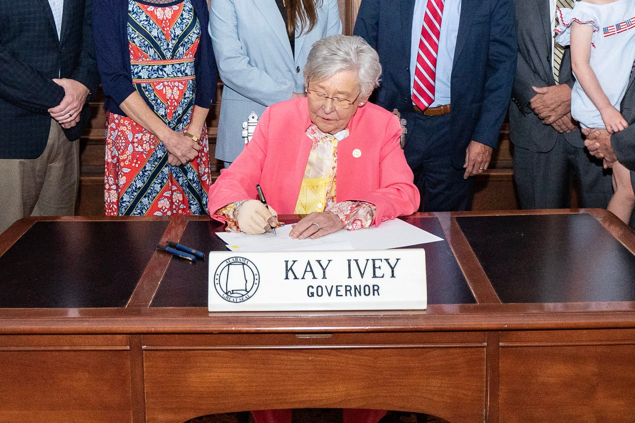 Kay Ivey signs