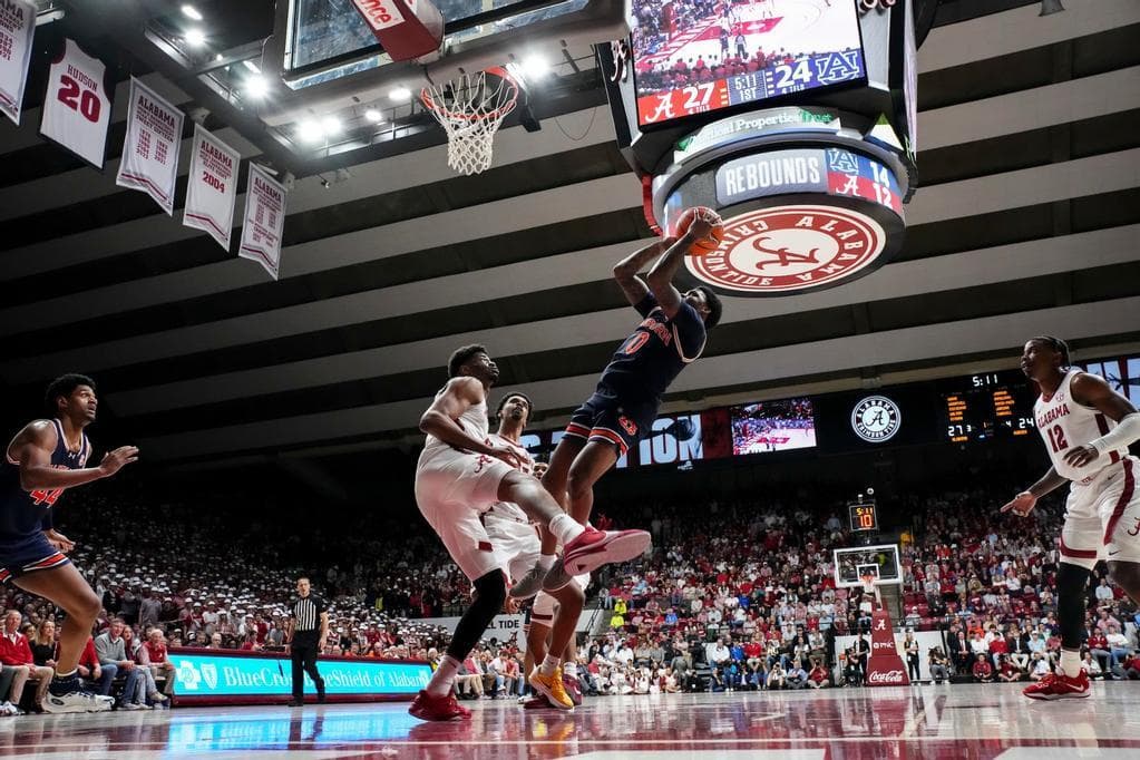 TUSCALOOSA, AL - JANUARY 24 - Auburn's K.D. Johnson (0) during the game between the #8 Auburn Tigers and the Alabama Crimson Tide at Coleman Coliseum in Tuscaloosa, AL on Wednesday, Jan. 24, 2024. Photo by Zach Bland/Auburn Tigers