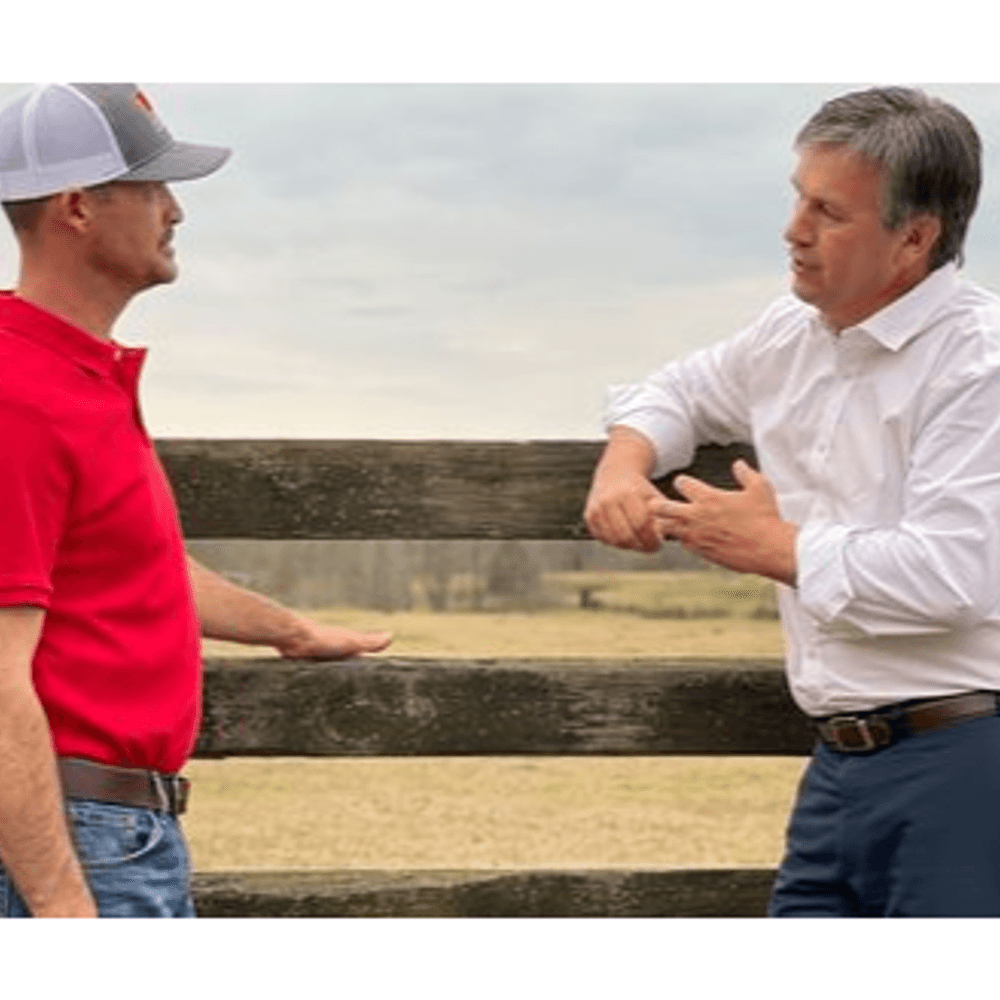 Barry Moore talks to a farmer 3