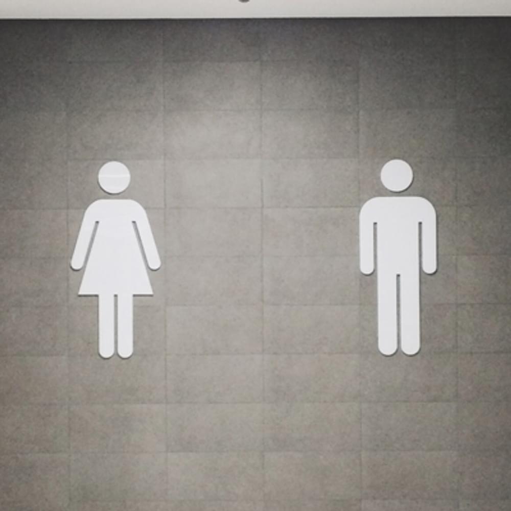 Bathroom man woman sex transgender by Juan Marin