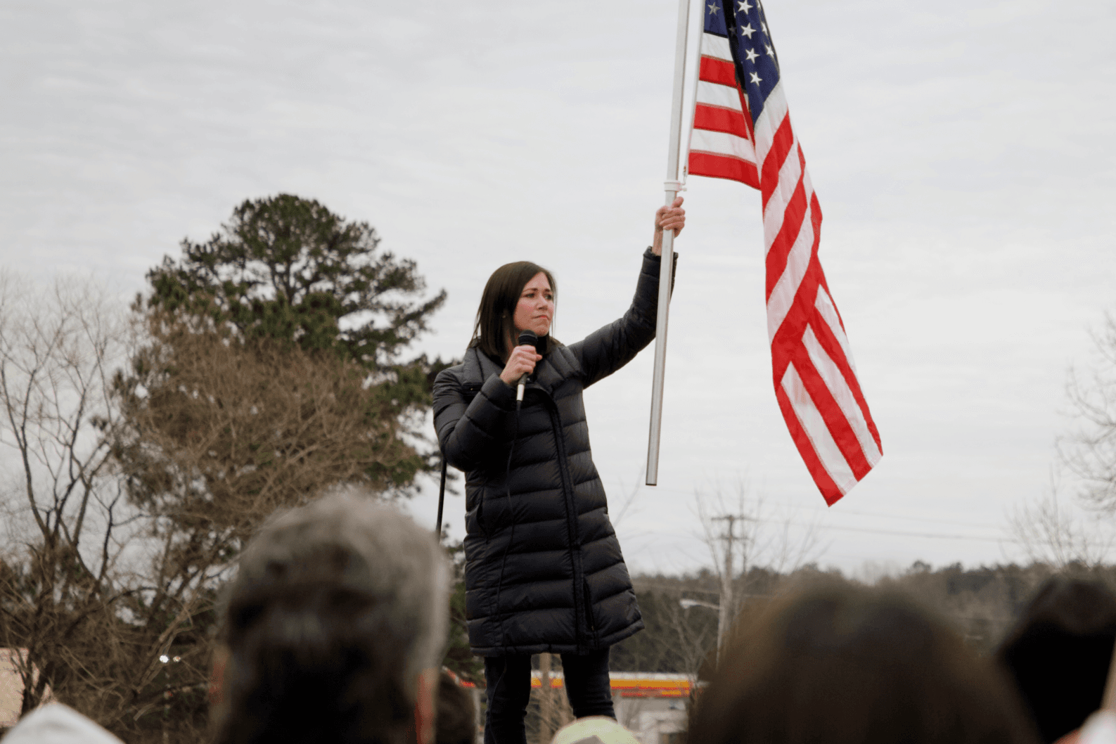 Katie Britt waving flag
