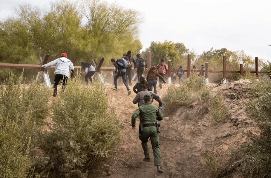 Migrants Running for Border