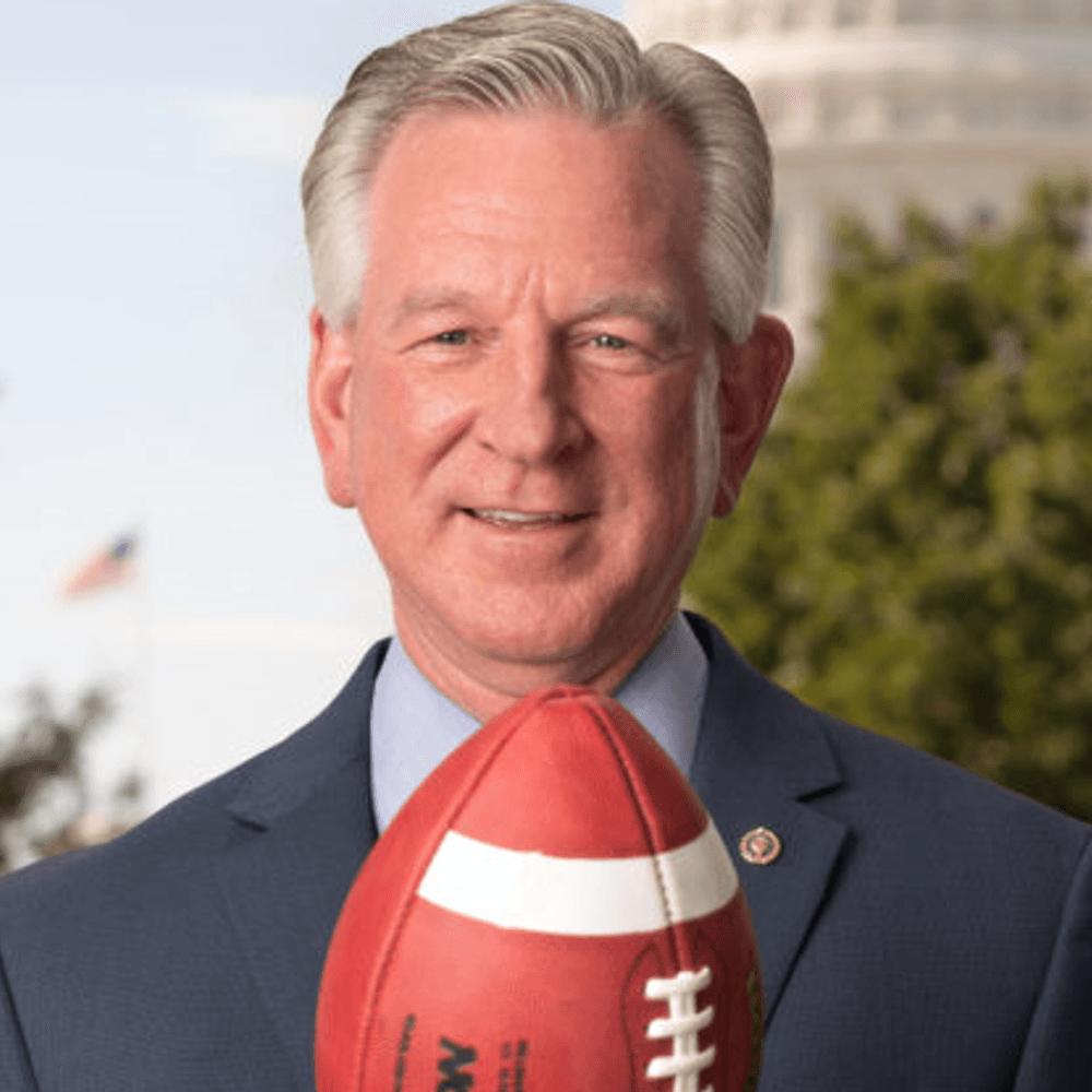 Tuberville with football 2