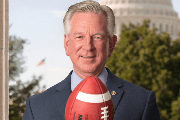 Tuberville with football 2