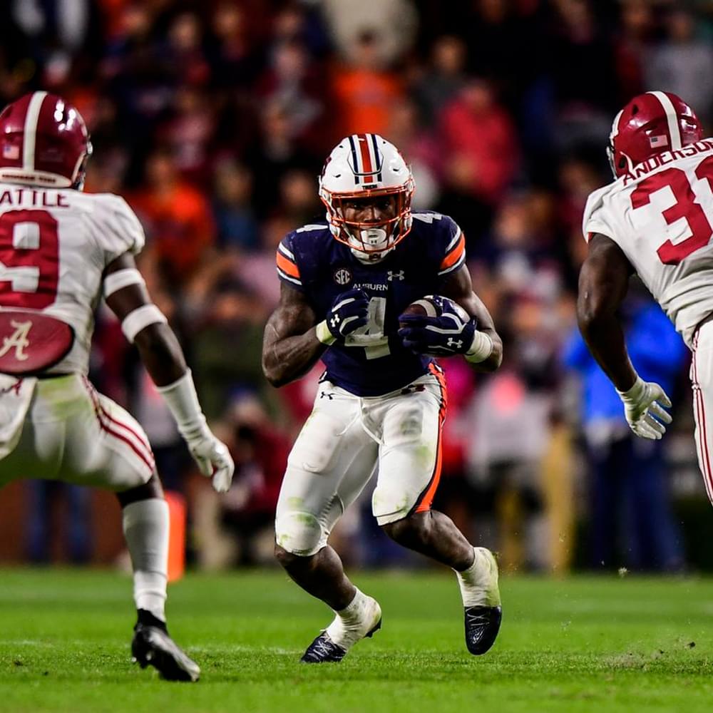 Tank Bigsby (4) and Auburn travel to Tuscaloosa for this year's Iron Bowl, where they will meet the likes of Alabama's Jordan Battle (9) and Will Anderson (31). (Jacob Taylor/Auburn Athletics)Jacob Taylor/AU Athletics