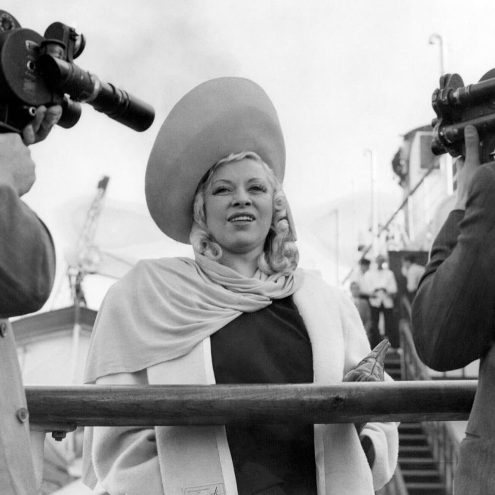 Mae West, who has come to England to star in her first London stage play, her own play Diamond Lil, is seen after her arrival at Southampton on Sept. 17, 1947, aboard the liner Queen Mary from New York. Alabama News