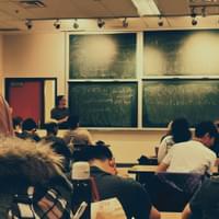 Classroom blackboards and teacher