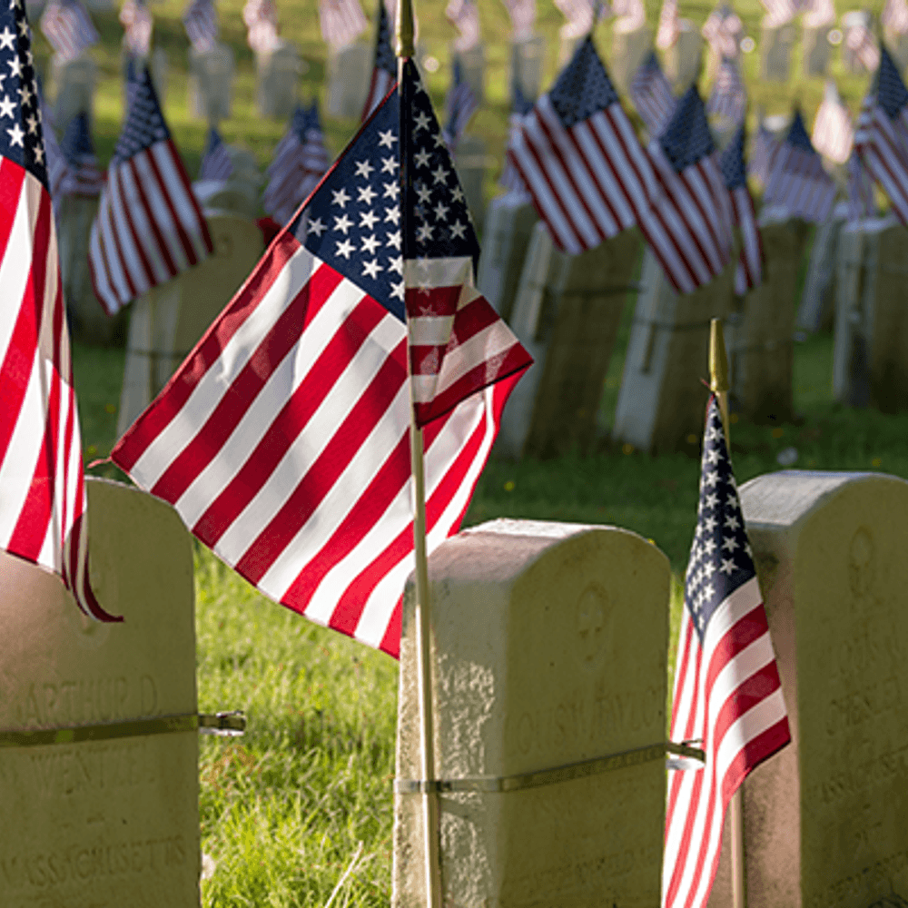 American flags at memorial grave site from Justin Casey