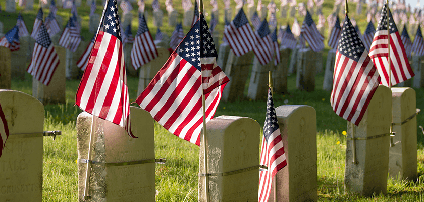 American flags at memorial grave site from Justin Casey