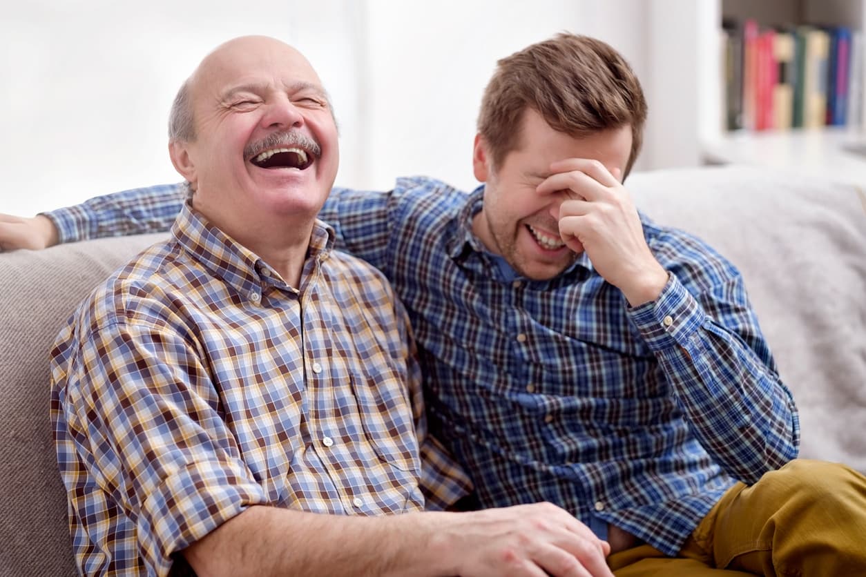 Father and son laughing