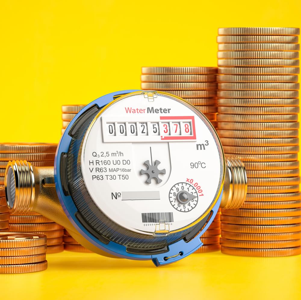 Water meter and coin stacks. Growth of water consumption, price and costs concept. 3d illustration Alabama News