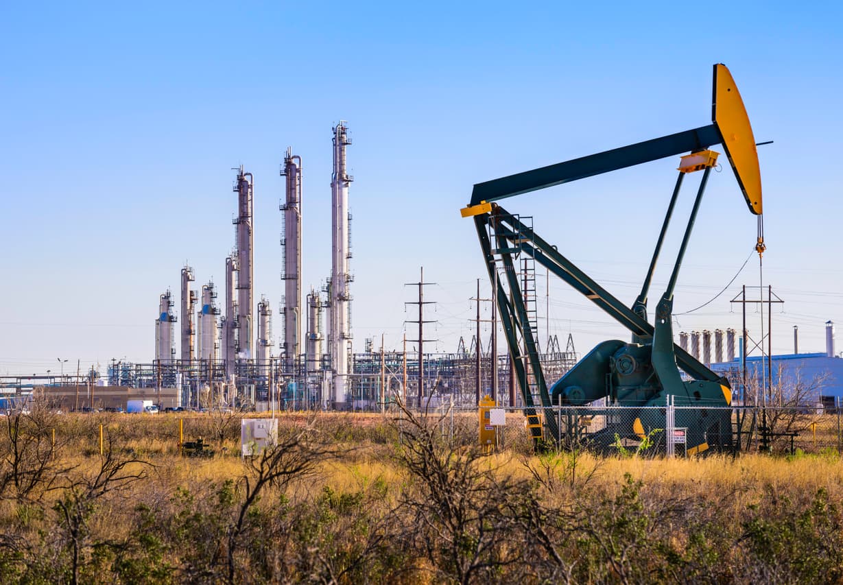 Pumpjack (oil derrick) and refinery plant