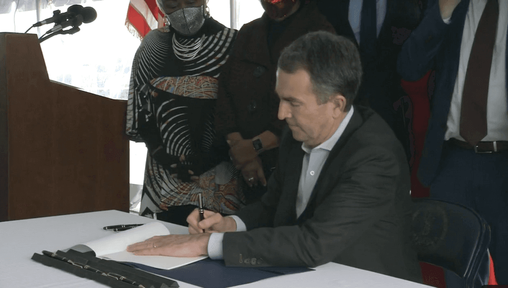 Governor Ralph Northam signs the bill abolishing the death penalty in Virginia.