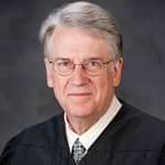 NEW VOICES: Federal Judge Underscores the "Heavy Price" of the Death Penalty
