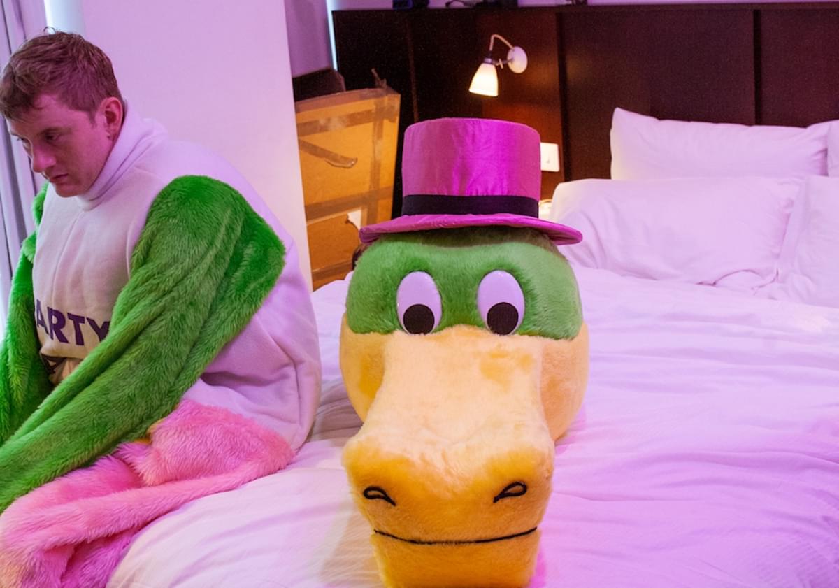 Temps mascot suit on bed