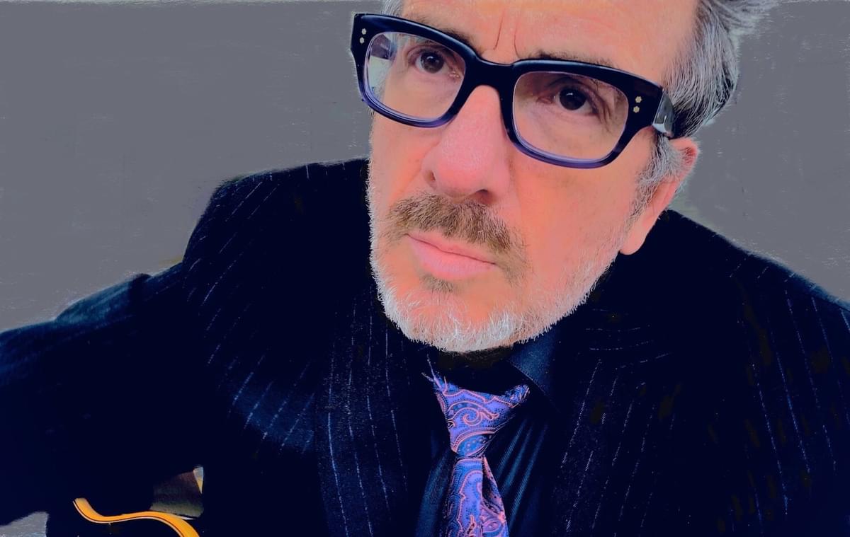 Elvis Costello announces new LP with lead single "We Are All Cowards