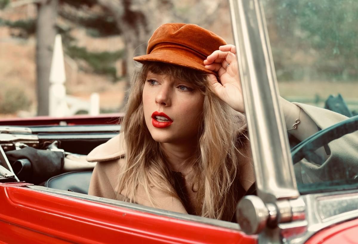 Taylor swift red press shot credit beth Garrabrant