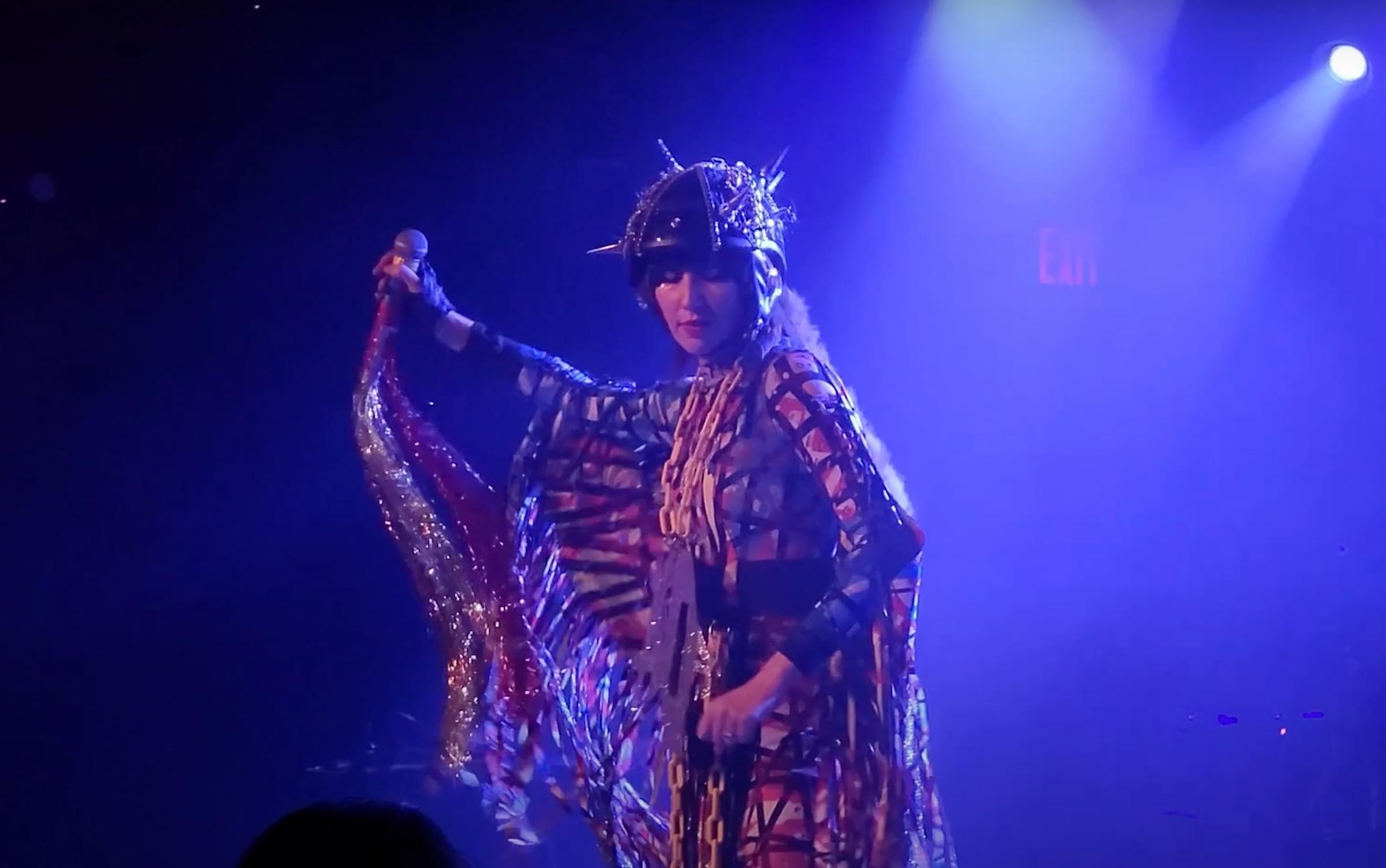 Watch Yeah Yeah Yeahs play new song "Spitting Off the Edge of the World