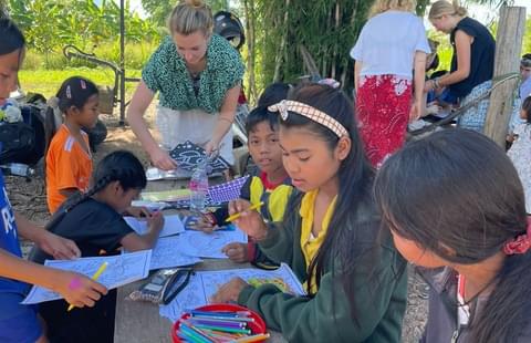 Emily colouring in with children small
