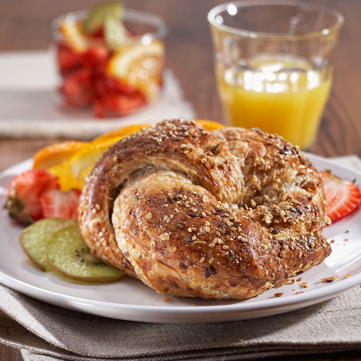 multigrain curved butter croissant with fruits