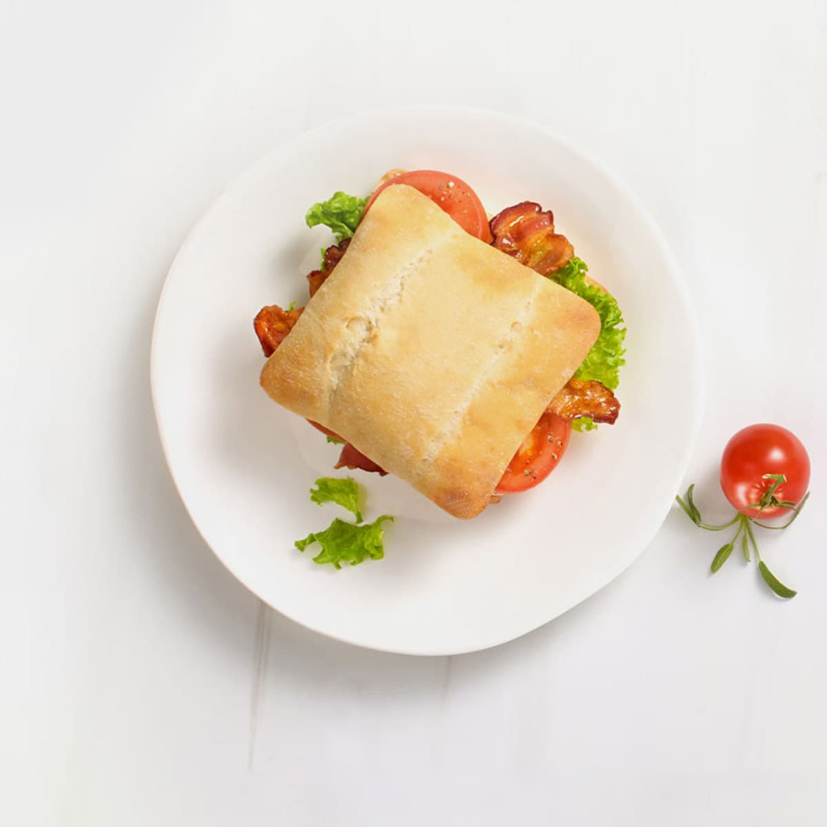 sliced soft artisan bread sandwich in a plate