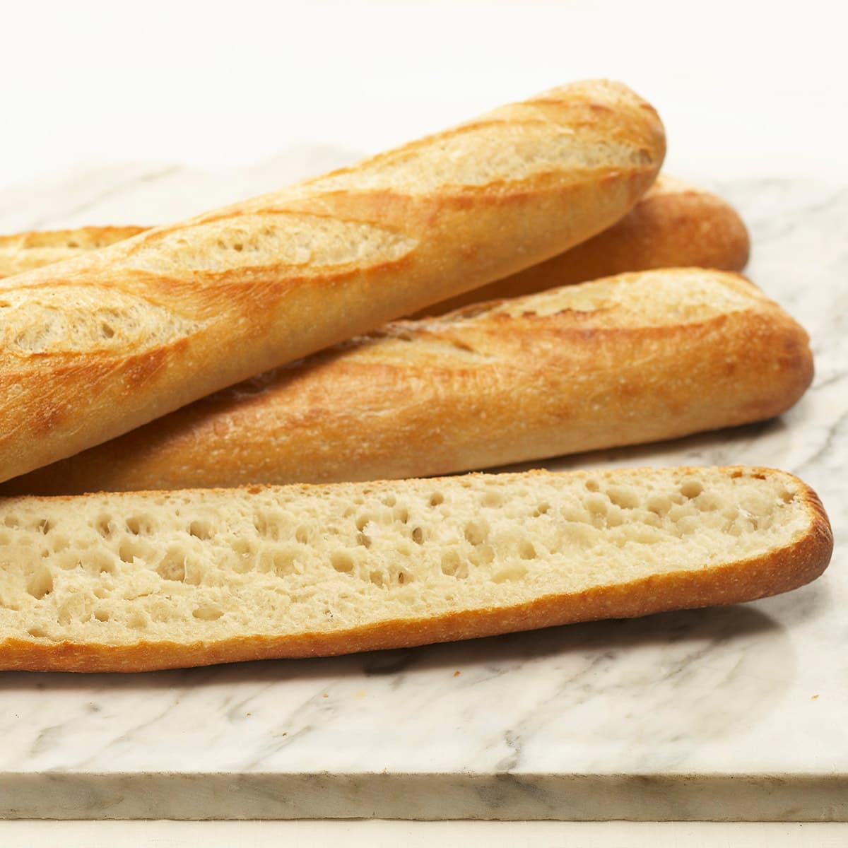 sliced golden baguette breads
