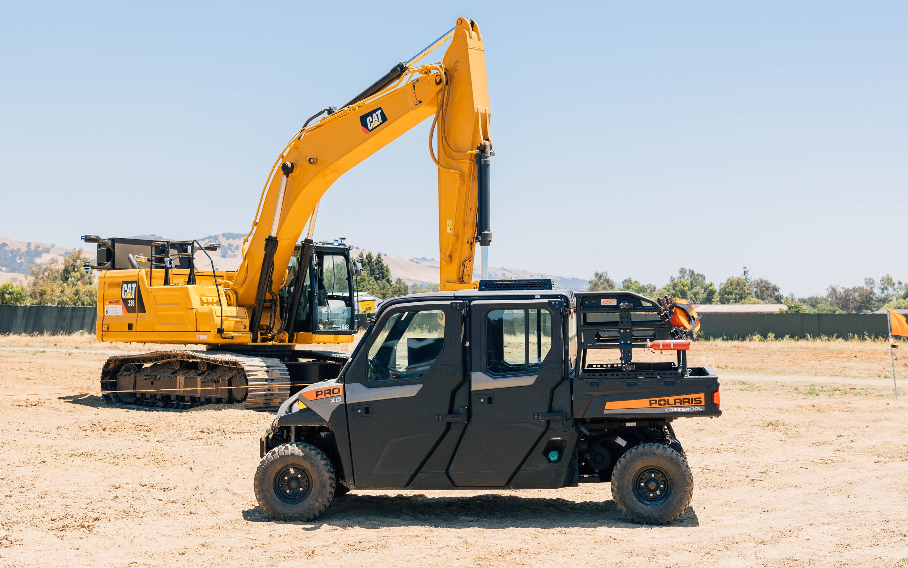 Utv next to robot