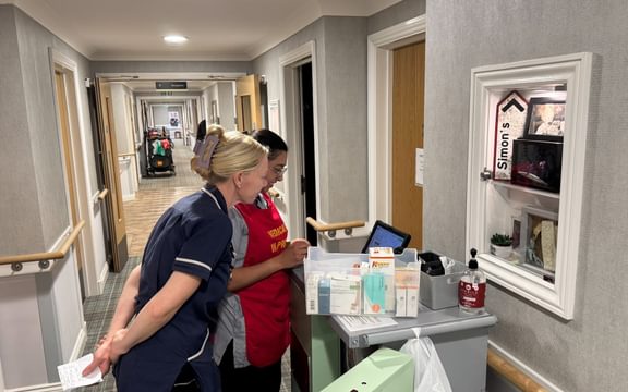 Care home nursing team do medication round using e-MAR technology