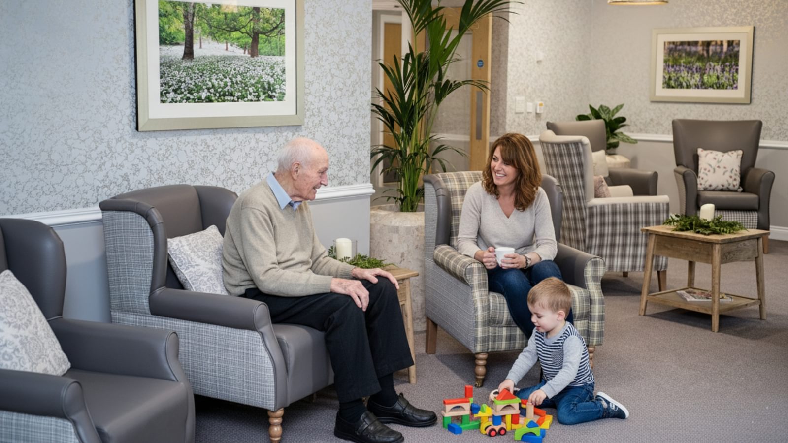 Broadbridge Hero image resident with his family in the lounge