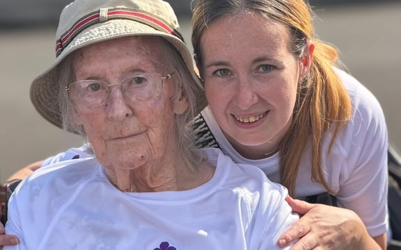 Care home resident and daughter on memory walk