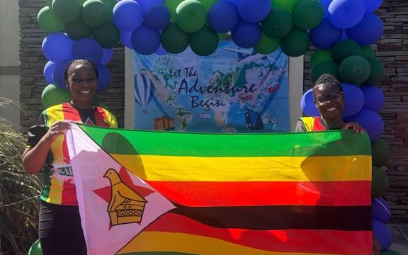Care home team with national flag