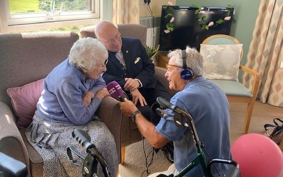 Resident Mildred being interviewed for the radio