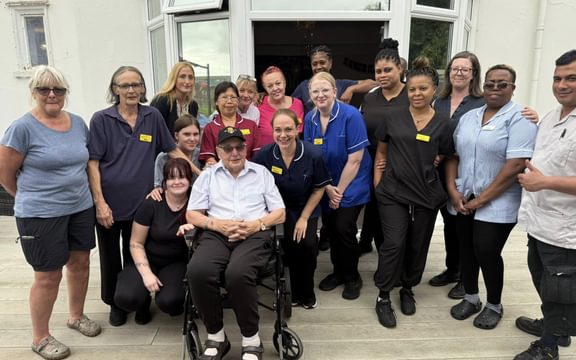 Resident celebrates 100th birthday with care home team
