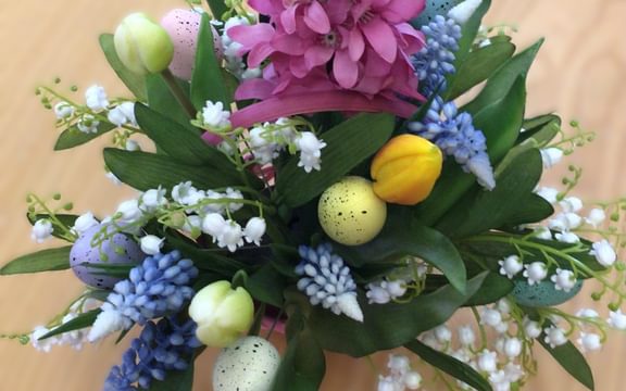 Beautiful Easter flower display created by wellbeing team in a care home