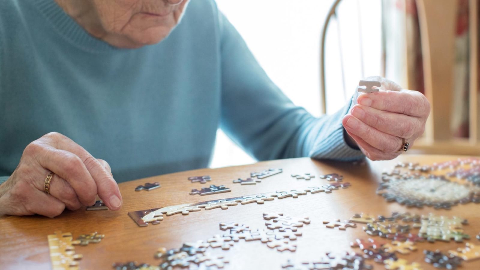 Hawkhill House Care Home Residents doing a jigsaw