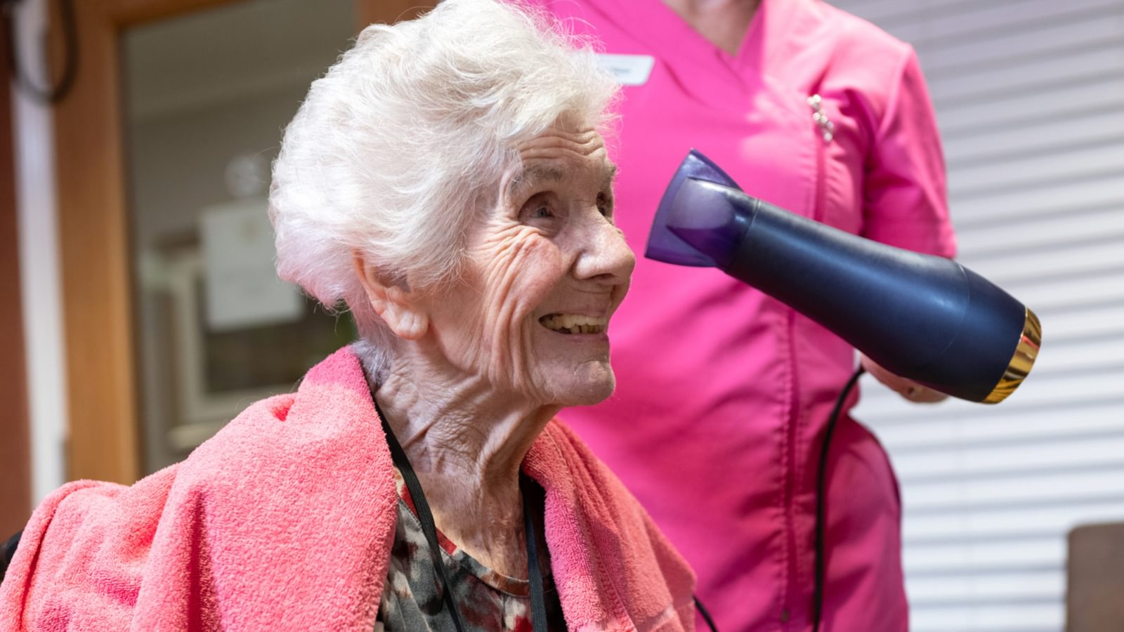 Homefield Grange Care Home in Christchurch, Dorset resident having her hair done in a care home salon