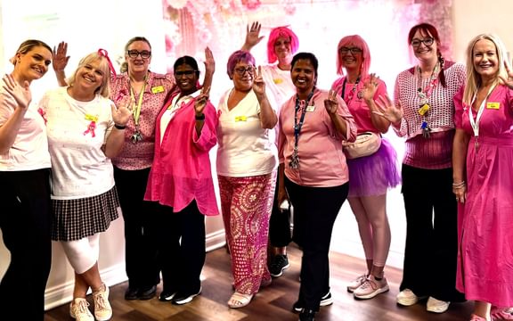Care home team dress in pink to support Breast Cancer Now fundraising event