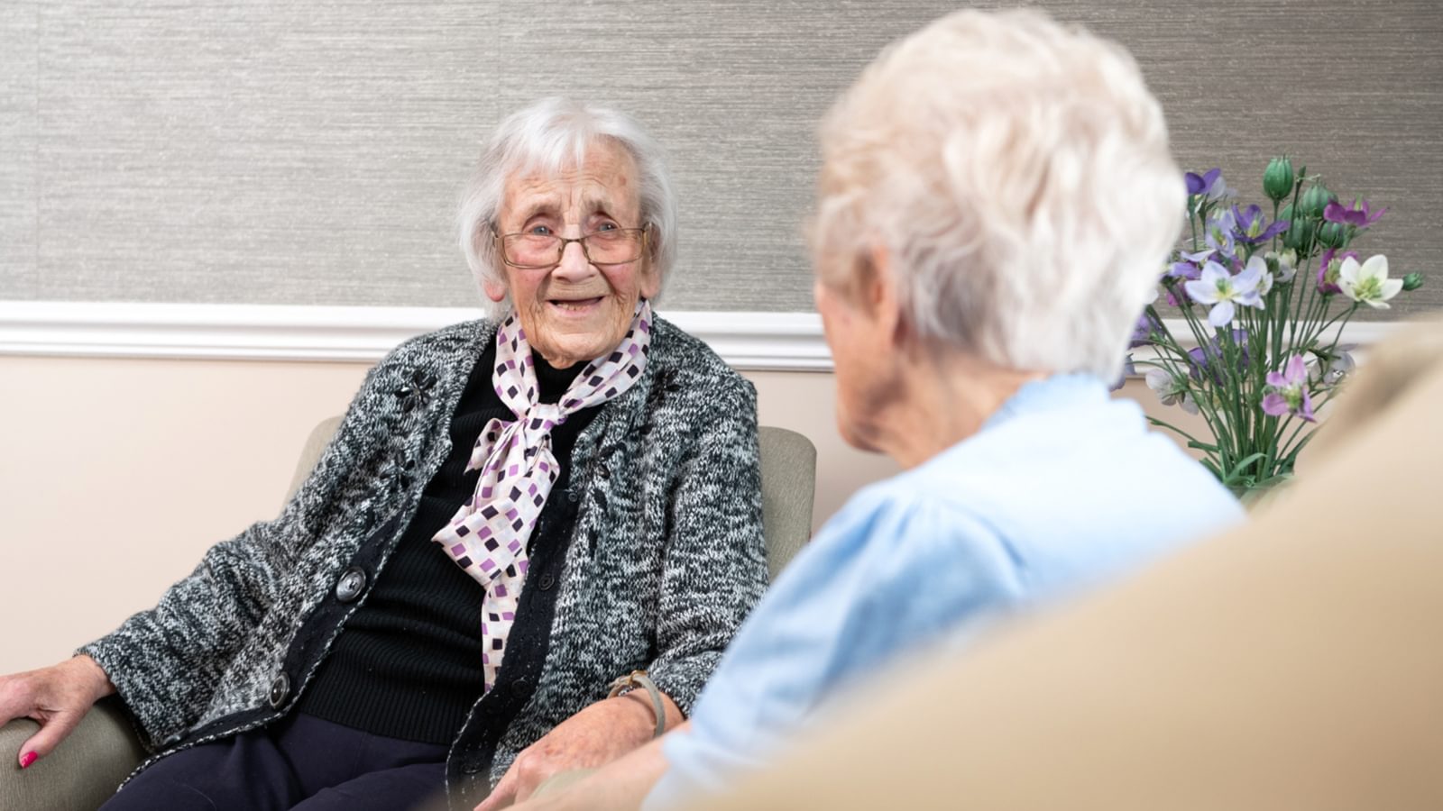 Sanford House Nursing Home in Dereham, Norfolk - two residents chatting