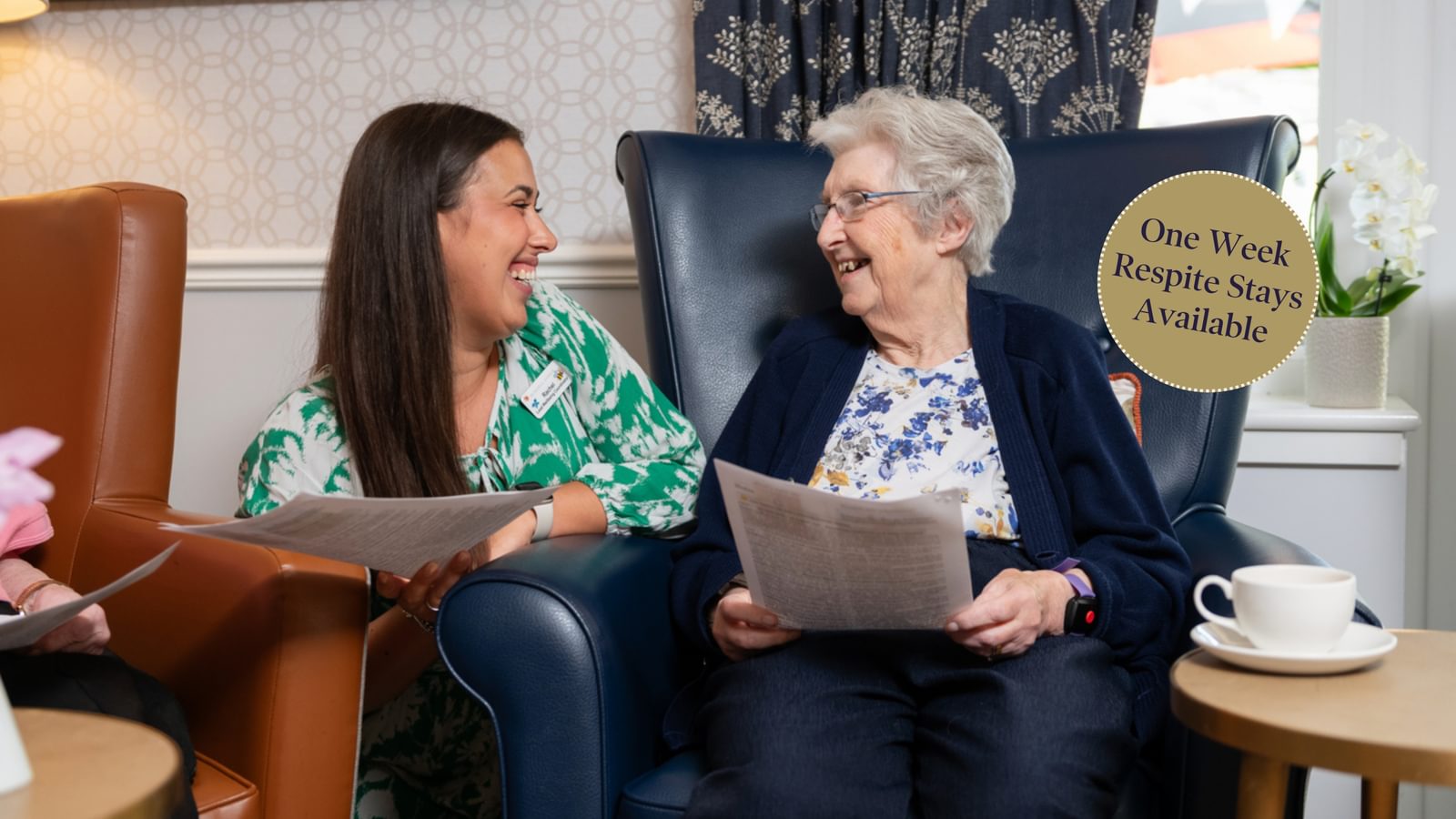 Tarring Manor Care Home Resident singing with a carer