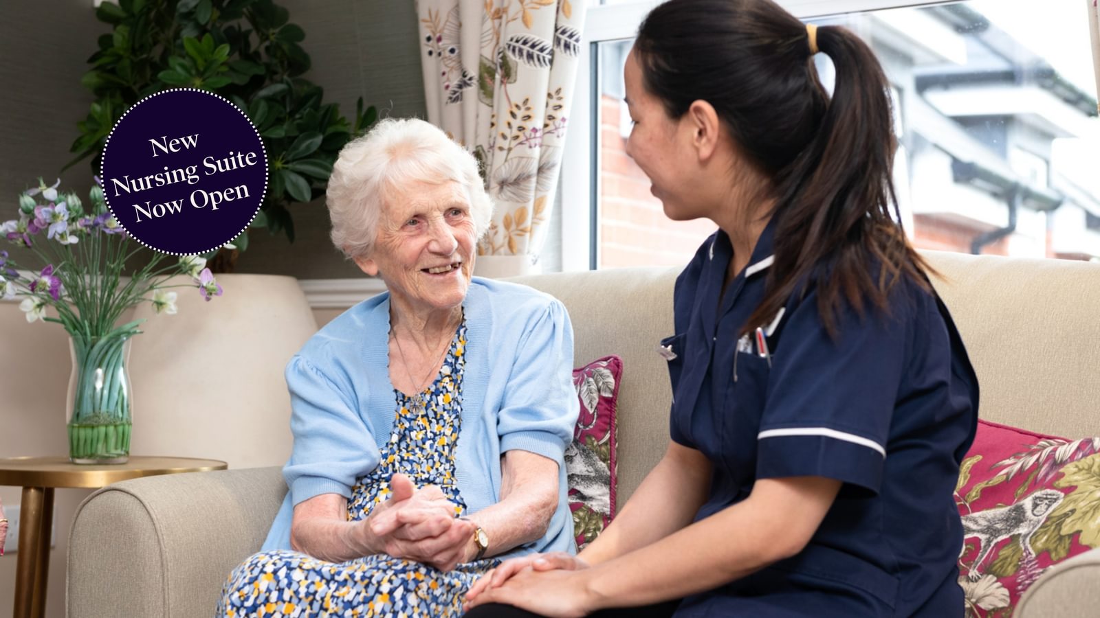 Tarring Manor Care Home Resident sitting with a nurse
