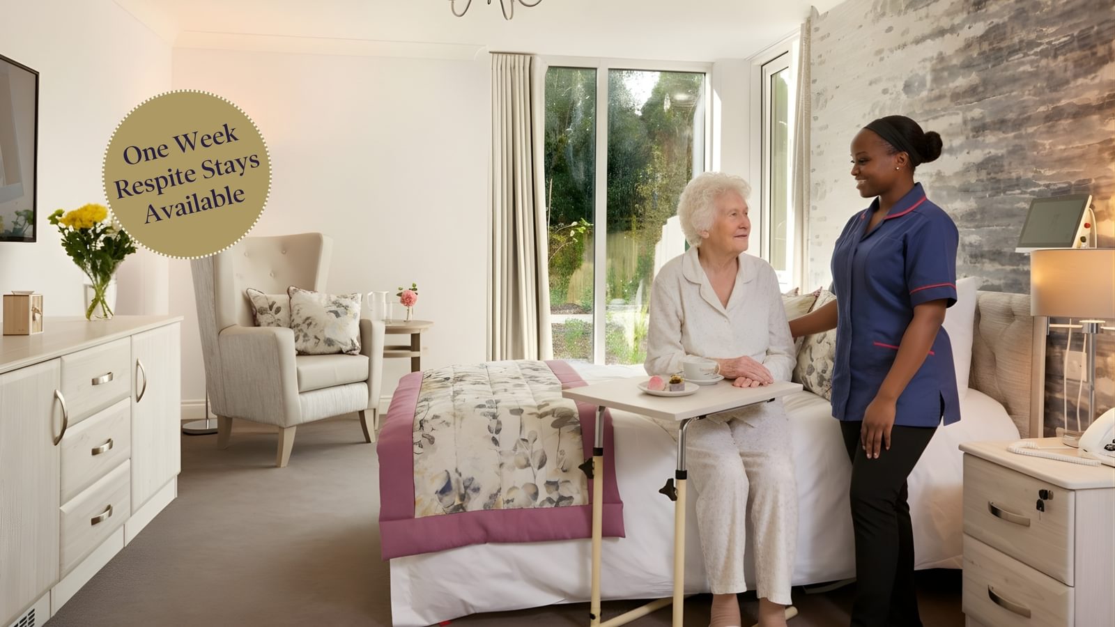 Tarring Manor Care Home resident in her bedroom with a nurse