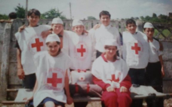 Old picture of children in red cross costumes