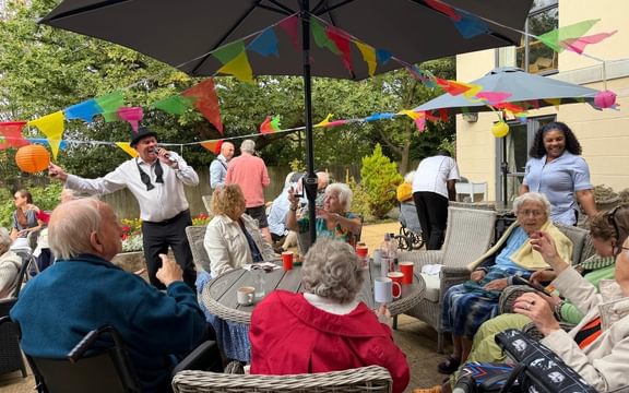 Garden party and singer in full swing at a care home