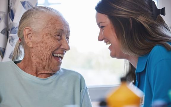 The Orchard Wellbeing Team with Resident