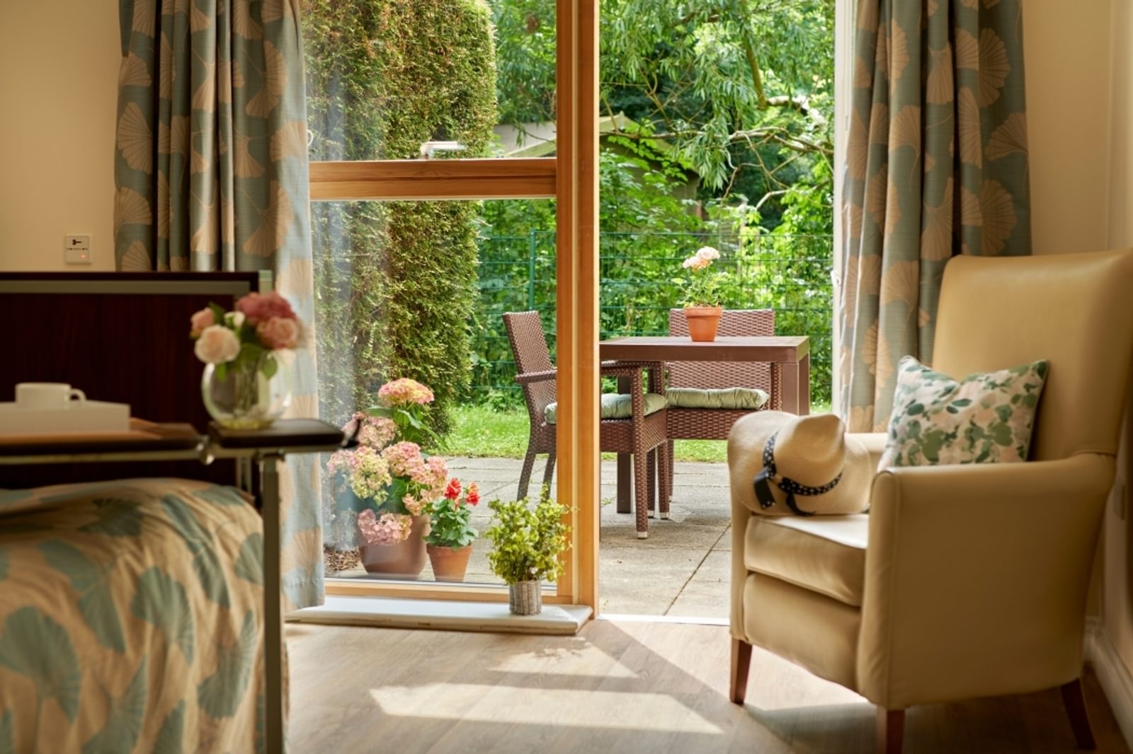 Whittington House Care Home in Cheltenham, Gloucestershire resident garden bedroom lounge area in a care home